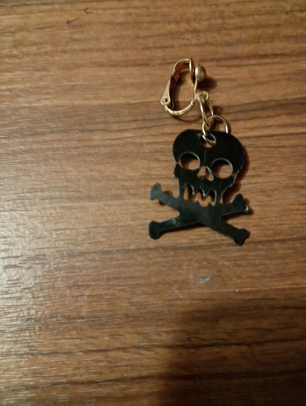 Skull Black Cross Bone Clip On Earring.one